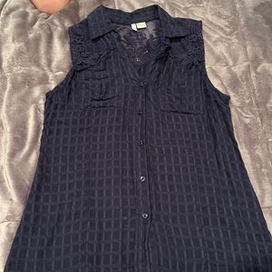 Large dark navy blue button-up sleeveless top